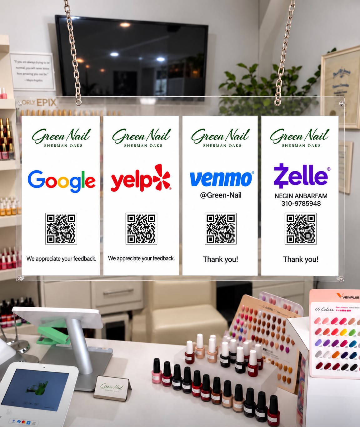 Green Nail salon front-desk display with Google, Yelp, Venmo, and Zelle QR cards
